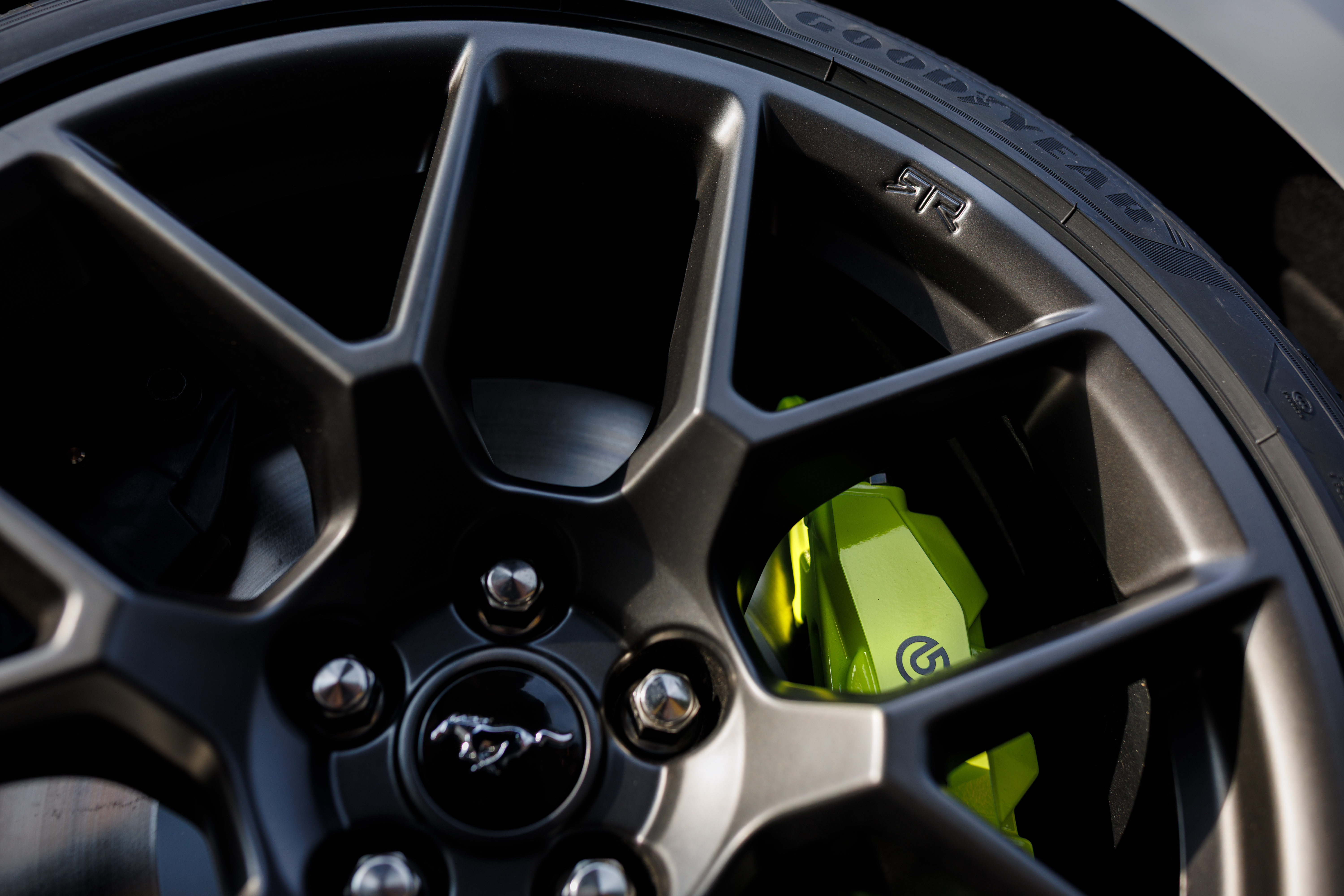Optional RTR package available on 2026 Ford Mustang EcoBoost fastback. Preproduction model shown with optional Hyper Lime brake caliper shown. Available late spring 2026.